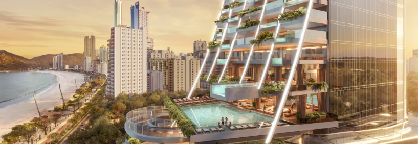 Área da piscina do Senna Tower em Balneário Camboriú, com iluminação moderna e detalhes arquitetônicos sofisticados que valorizam as curvas do projeto.